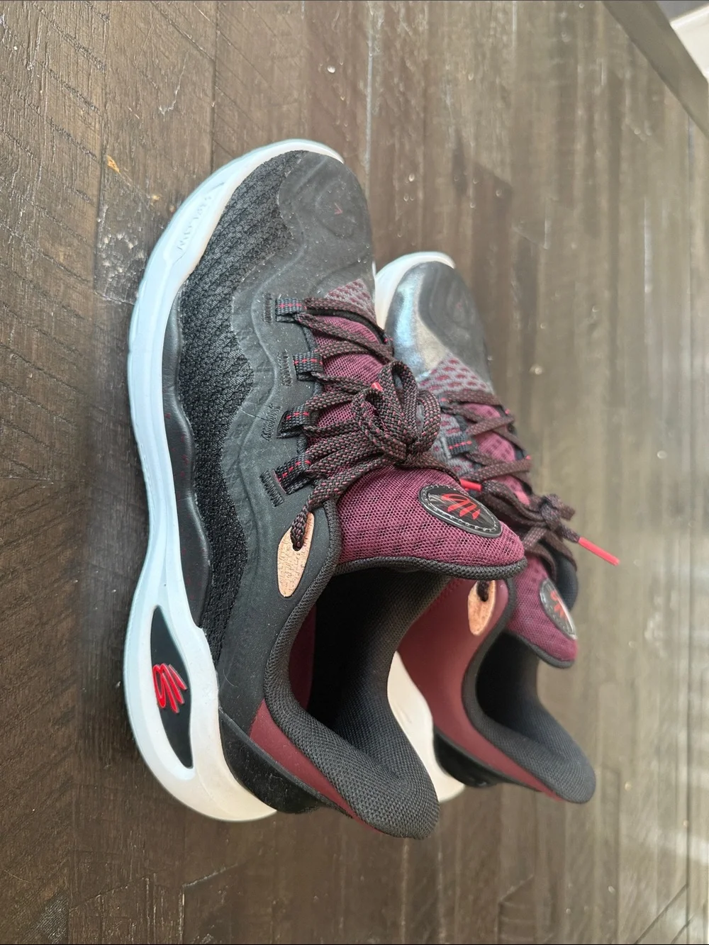 Under Armour Men's Athletic Shoes Curry 11 in Black and Burgundy